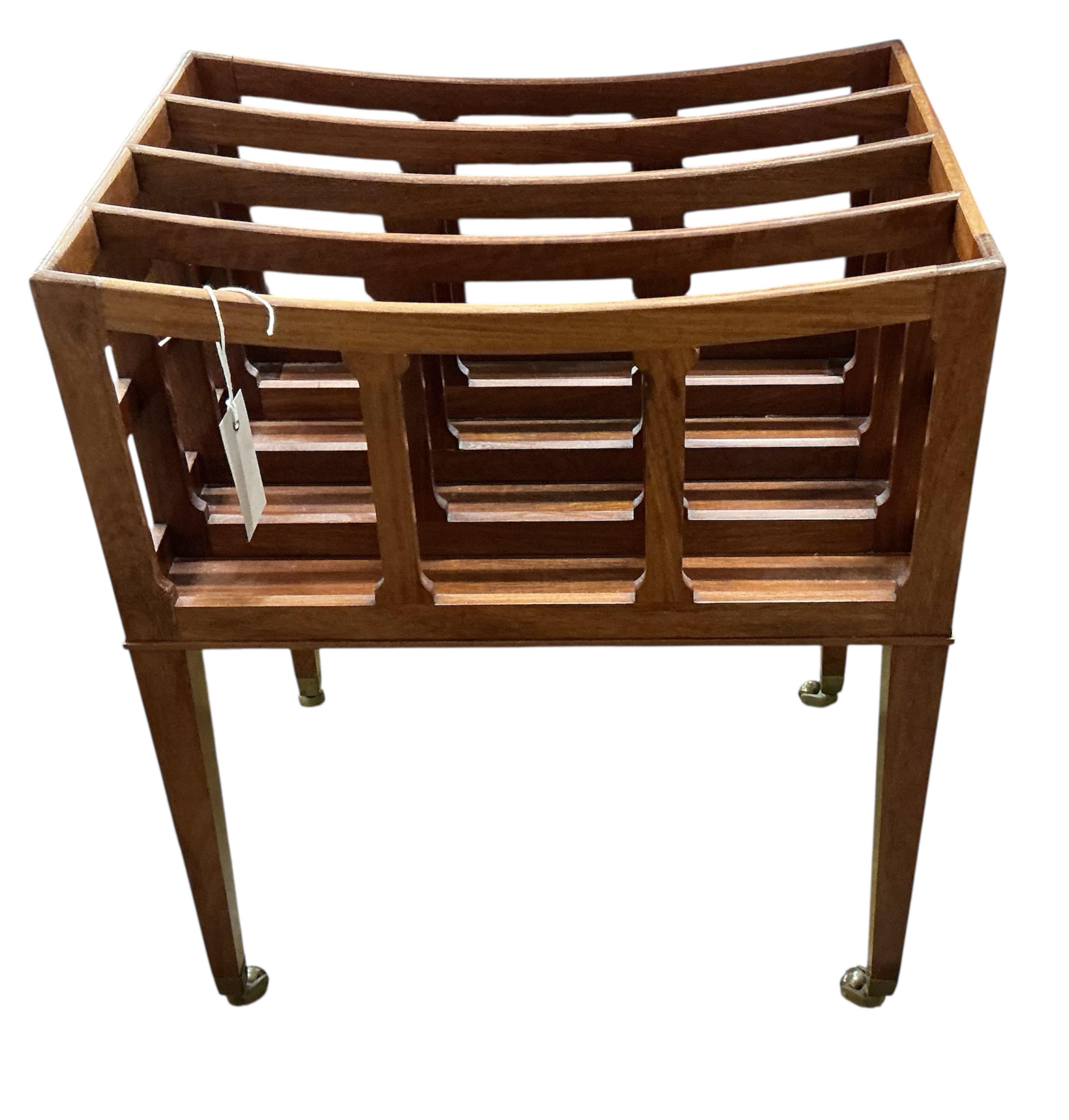 A reproduction mahogany four division Canterbury, width 45cm, depth 31cm, height 56cm